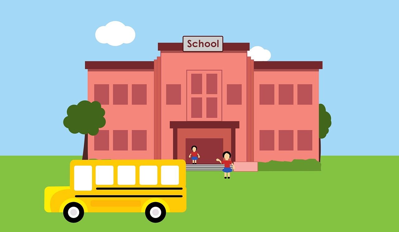 clipart image of school with school bus