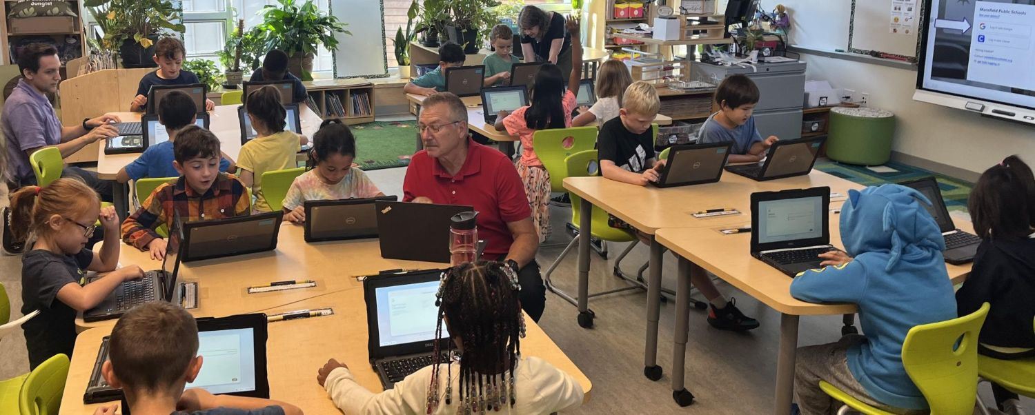 Students using technology to support their learning.